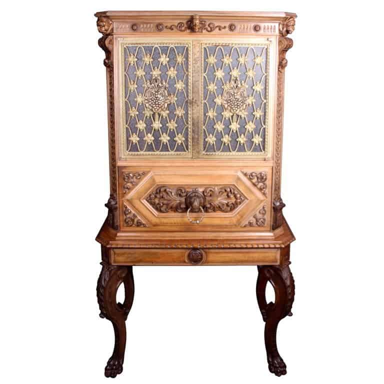 A Fine Italian Carved Walnut Cocktail Cabinet