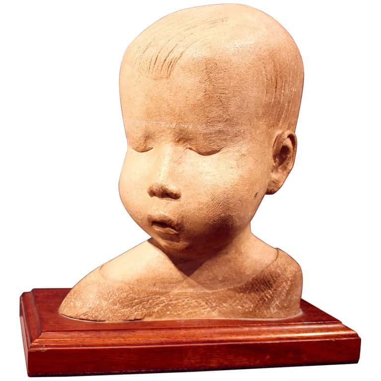 An Early 20th Century Carved Stone Bust of a Young Child In The Manner Of Sir Jacob Epstein