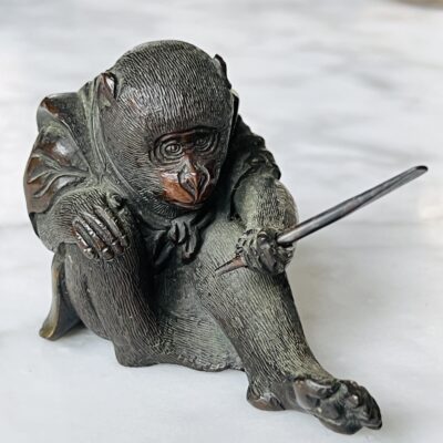 A Small Meiji Japanese Bronze Figure of a Monkey Wearing a Kimono