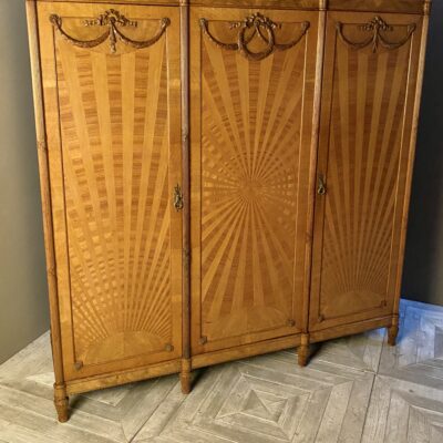 An Edwardian Satinwood Triple Wardrobe Circa 1910