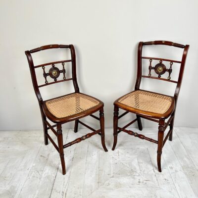 Pair Of Regency Style Simulated Rosewood And Cane Chairs