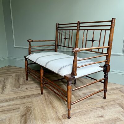 A Rare Walnut Two Seater Argyle Settee By Liberty & Co. London