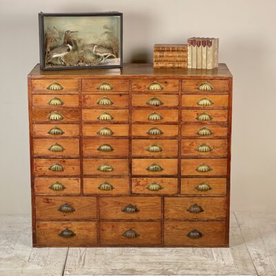 A Bank Of Graduated Chemist Drawers Circa 1890