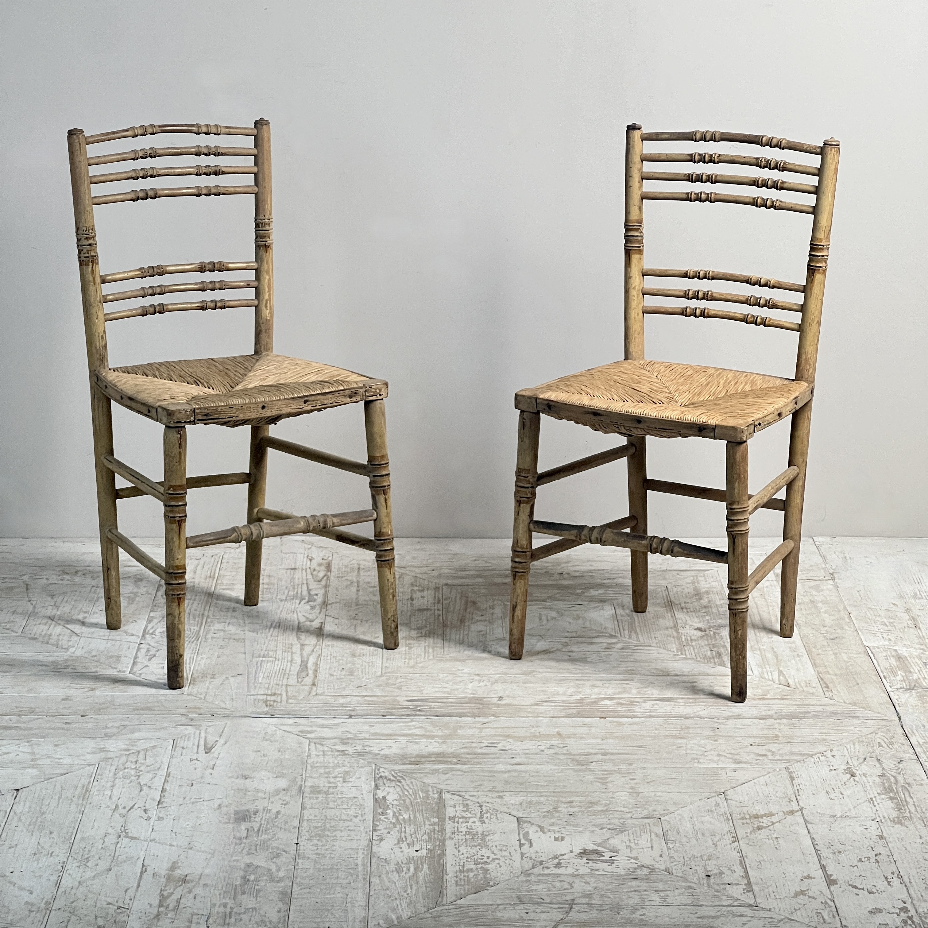 A Pair Of Painted Regency Faux Bamboo And Rush Seat Chairs - Image 3