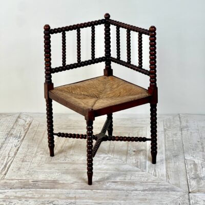 A 19th Century Corner Bobbin Chair With Rush Seat