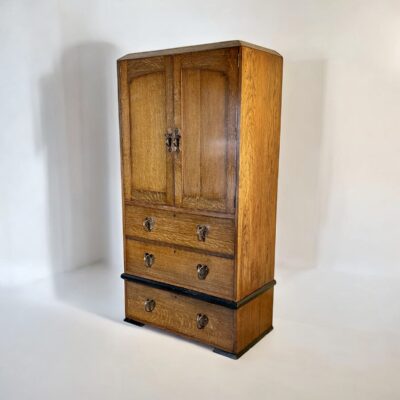 An Arts & Crafts Oak Linen Press In The Manner Of Liberty London
