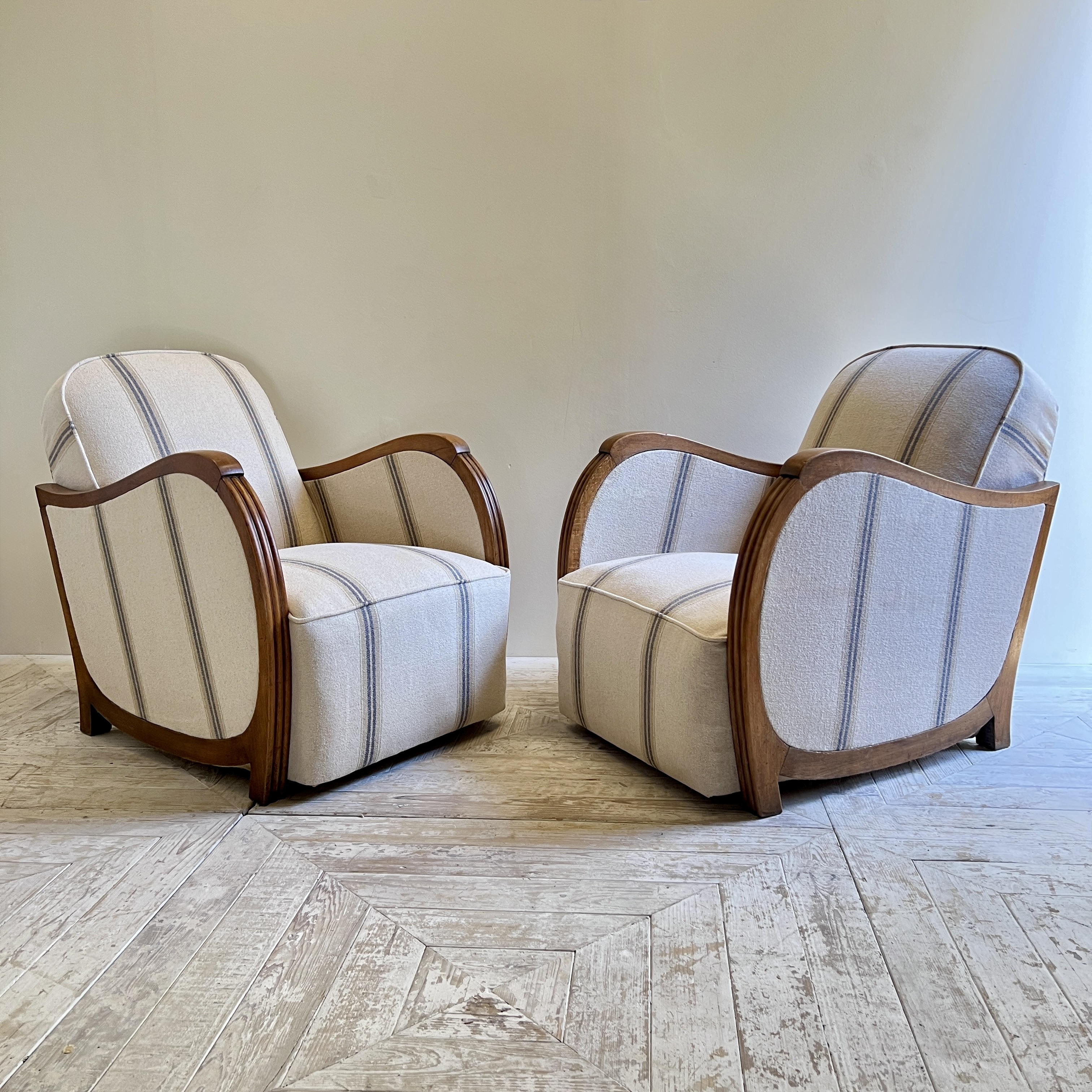 A Pair Of French Art Deco Linen Upholstered Armchair